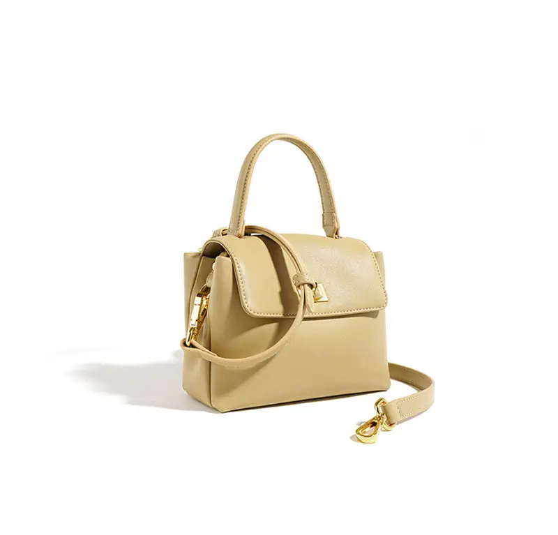 Bolsa feminina de couro bovino textura macia com botão dourado estilo mini loja cidade nova moda bolsa de ombro crossbody