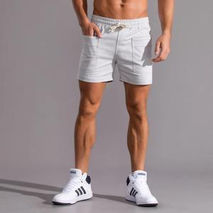 Nuevo estilo de verano para hombres Waffger moda casual deportes al aire libre estilo de playa pantalones cortos con cordón de color sólido - Product Image 3