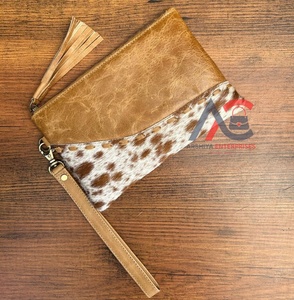 Venta al por mayor de moda de lujo de diseñador de cuero de vaca bolso de mano para las mujeres de alta calidad de cuero genuino cartera borla cremallera bolsa - Product Image 1
