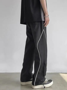 Pantalones de chándal acampanados sueltos informales de alta calidad personalizados para hombre, pantalones de chándal con botones laterales de poliéster para correr de nailon para hombre - Product Image 2