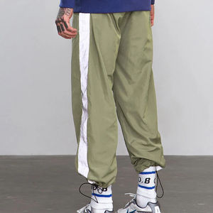 Veste coupe-vent unisexe tendance en nylon, coupe régulière, poches latérales à fermeture éclair, pantalon en nylon ajusté, séchage rapide, bas ample - Product Image 4