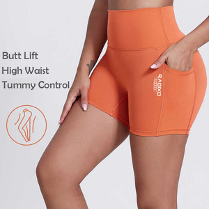 กางเกงขาสั้นออกกำลังกายเอวกลางไร้ตะเข็บแบบรัดรูปสำหรับผู้หญิง เป็นมิตรกับสิ่งแวดล้อม ปิดด้วยยางยืด ลายเรียบ สำหรับวิ่ง โยคะ ฟิตเนส - Product Image 1