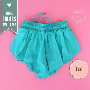 Short d'été tendance pour enfants avec ceinture réglable disponible en couleurs vives, idéal pour porter tous les jours, faire du sport et jouer - Product Image 4