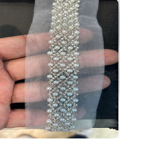 Cordones bordados a máquina hechos a medida en tela de base de red blanca en diseños abstractos y perlas adjuntas para vestidos de novia - Product Image 1