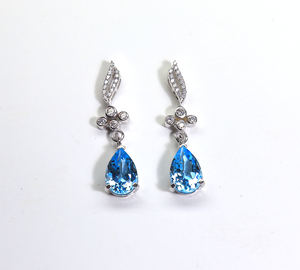 ต่างหูพลอยบลูโทแพซแท้จากสวิสเซอร์แลนด์ รูปทรงลูกแพร์ ขนาด 10x7 มม. ขัดเงาอย่างดี ของขวัญสำหรับเธอ - Product Image 6