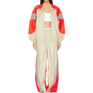 Chándales a prueba de viento para mujer, nuevo diseño, cremallera completa, nailon, ligero, cortavientos de manga larga para mujer, conjunto de nailon de retazos, OEM - Product Image 1