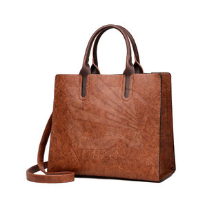 Servicio OEM Venta al por mayor Bolso de cuero de moda para mujer Nuevo diseño Color sólido Bolso de cuero de moda para mujer - Product Image 1