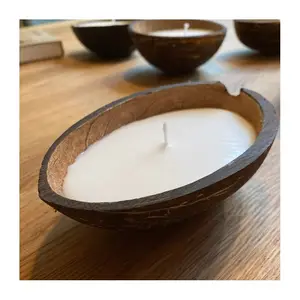 Cheap price candle in oval coconut bowl jars wholesale aromatic scented candles for resale with tropical pleasant smell