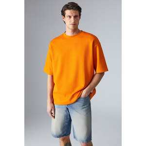GRIMELANGE เสื้อยืดโอเวอร์ไซส์ผ้าฝ้ายออร์แกนิก 100% สำหรับผู้ชาย ผ้าเนื้อหนา พร้อมรายละเอียดป้ายปักพิเศษ - Product Image 1