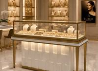 Vitrine de présentation de bijoux rectangulaire en verre éclairée de luxe pour comptoir, idéale pour la présentation de colliers, bracelets et bagues en magasin.