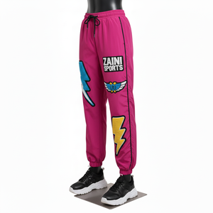 Pantalon coupe-vent pour femme en tissu nylon taffetas, toucher doux, panneaux contrastés roses avec logo en chenille personnalisé, pantalon coupe-vent - Product Image 4