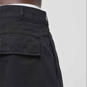 Pantalones cortos Cargo de alta calidad para hombre con bolsillos mezcla de algodón de secado rápido cintura elástica entrenamiento gimnasio pantalones cortos para hombres correr Joggers - Product Image 4