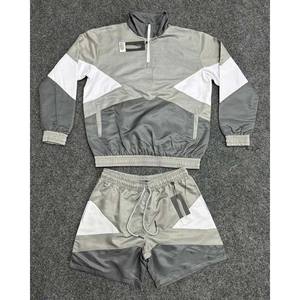 Conjuntos de pantalones cortos cortavientos para hombre Conjunto de chándal de nailon de poliéster para hombre Diseño personalizado OEM Chaqueta de bloque de color de pista para hombre HIGH STREET - Product Image 3