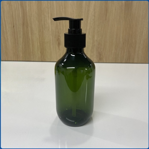 Bouteilles cylindriques vert foncé en plastique PET confortables de 500ml du fabricant du Vietnam pour l'emballage de soins de la peau de shampooing de cosmétiques - Product Image 1