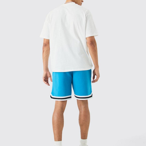 Pantalones cortos de malla de baloncesto totalmente sublimados de alta calidad personalizados cintura elástica cordón transpirable pantalones cortos de malla sólida - Product Image 5