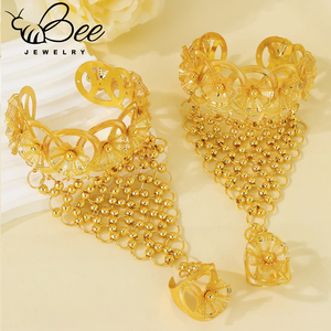 กำไลข้อมือและแหวนนิ้วชุบทอง 24K ดีไซน์ดอกไม้โปร่ง ทันสมัย สำหรับผู้หญิง งานแต่งงาน วัสดุอัลลอยด์ - Product Image 1