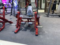 Machine commerciale d'extension des jambes assise, entraîneur de quadriceps, à charge libre, avec cadre en tube ovale plat en acier peint, pour entraînement du bas du corps en salle de sport