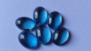 Fine Qualité Naturel Londres Bleu Topaze Ovale 7X9mm Cabochon Lâche Dos Plat Bleu Topaze Facette Gemme En Gros Lot Pour Bijoux - Product Image 3