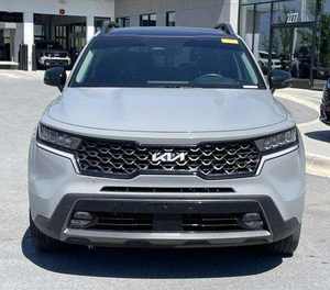 Gris 2024 K i a Sor ento Hybrid SX-Prestige AWD con asientos de cuero Sistema de navegación de techo solar de arranque remoto Asientos de tercera fila - Product Image 1