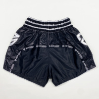 Short de Muay Thai teint en couleur unie de qualité supérieure pour hommes Short durable en polyester 100% pour hommes