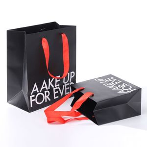 ถุงกระดาษคราฟท์สีดำสำหรับเสื้อผ้าเครื่องสำอางแบบชดเชยพิมพ์โลโก้ของคุณเองสำหรับงานฝีมือของขวัญช้อปปิ้ง - Product Image 4