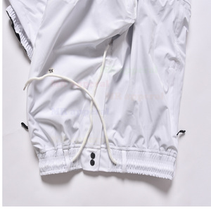 Venta al por mayor de alta calidad de las mujeres de esquí de los pantalones de nieve de la fabricación de ligero Soft Shell impermeable a prueba de viento holgado cortavientos Extra - Product Image 3