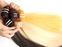 Top qualité meilleure vente vente en gros couleur tissage de cheveux paquets de cheveux vierges crus Extensions de cheveux 100% cuticule torsadée
