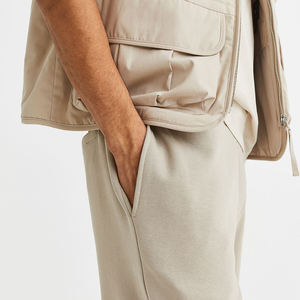 Pantalones de chándal acampanados Bootcut de cintura media personalizados con borde de corte bordado de ropa de calle para dobladillo crudo patrón recto diseño acampanado - Product Image 5