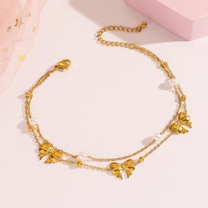 Tobilleras de Moda con Diseño Exclusivo Recién Desarrollado, Chapadas en Oro, de Acero de Titanio, con Lazo y Perla - Product Image 2