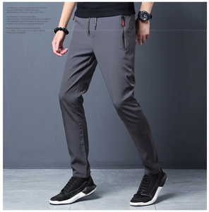 Pantaloni Casual da uomo elasticizzato Slim Fit elastico in vita Jogger coreano <span class=keywords><strong>classico</strong></span> nero nero <span class=keywords><strong>grigio</strong></span> pantaloni di marca Plus Size 4XL 5XL - Product Image 3