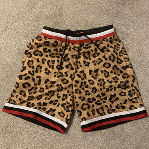 Short de sport en maille pour hommes, imprimé de basket-ball en sublimation, conçu sur mesure en polyester, short de basket-ball décontracté en maille - Product Image 1