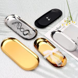 Plateau de rangement ovale minimaliste en or, plateau de toilette ovale en or, plateau à bijoux et à bibelots en or, organisateur de salle de bain décoratif en or - Product Image 1