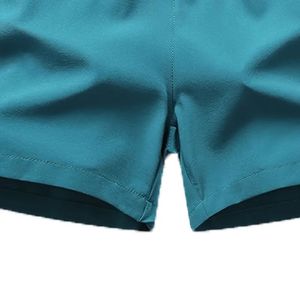 Shorts de sport pour homme à taille mi-haute, couleur unie, séchage rapide, légers, respirants, pour l'entraînement, la course et le fitness, avec taille élastique - Product Image 4
