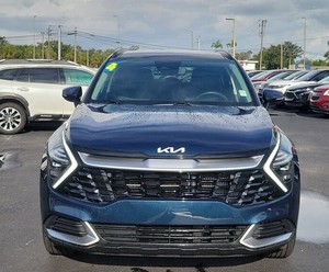 Bleu 2025 Kia Sportage hybride SX-Prestige AWD utilisé avec les sièges en cuir système de navigation démarrage à distance toit ouvrant Android Auto - Product Image 1