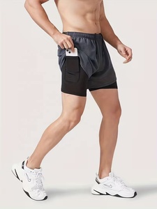 Shorts de sport pour homme, couleur unie, avec poches, séchage rapide, taille élastique, longueur mi-cuisse, en spandex et polyester, pour l'entraînement - Product Image 3