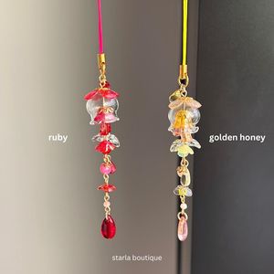 เสน่ห์ของโทรศัพท์แมงกะพรุนแก้ว: อุปกรณ์เสริมสำหรับชีวิตทางทะเลสุดน่ารักพร้อมลูกปัด - Product Image 4