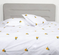 Ensembles de literie personnalisés en gros 100% coton housse de couette taies d'oreiller brodées tournesol motif végétal pour la maison hôtel mariage