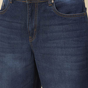 Jeans rasgados desgastados para hombres con un ajuste cónico y jeans rasgados resistentes con borde delantero a la moda - Product Image 6