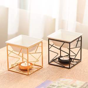 This <b>oil</b> <b>burner</b> a metal warmer with a ceramic bowl is a home decor item and an aromatherapy <b>fragrance</b> diffuser - Product Image 2