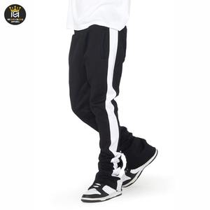 กางเกงวอร์มขาบานด้านข้างของผู้ชายกางเกงแบ็กกี้ทรงหลวมโอเวอร์ไซส์แบบลำลองสำหรับใส่กลางแจ้ง2026โลโก้แบบกำหนดเอง - Product Image 1