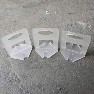 Herramienta de construcción moderna a prueba de agua, sistema de nivelación seguro para villas, bolsa de 1kg de azulejos de pared cruzados autoadhesivos de 1mm y 2mm para hoteles - Product Image 1