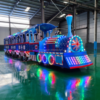 Un train touristique électrique sans rails populaire pouvant transporter des passagers, des magasins, des parcs et des enfants.