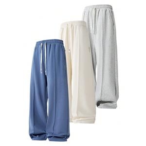 กางเกงวอร์มขายดีปี 2026 ผลิตจากโพลีเอสเตอร์ 100% เป็นมิตรกับสิ่งแวดล้อม ทรงโอเวอร์ไซส์ สไตล์ลำลอง สีดำฟอกแบบดิสเทรส ขากว้าง - Product Image 1