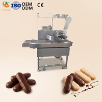 La machine à enrober les biscuits au chocolat haute capacité avec tunnel de refroidissement est utilisée pour la production de biscuits en forme de doigt.