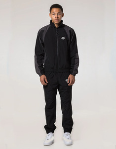 Conjunto de Chaqueta y Pantalones Deportivos de Dos Piezas, Estilo Urbano, Talla Grande, Invierno, Bloques de Color, Algodón Arrugado, Cortavientos, Fabricante de Ropa Personalizada - Product Image 1