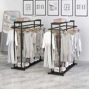 Expositor de ropa comercial de alta resistencia, totalmente metálico, con doble colgador, tipo isla, para tiendas minoristas y boutiques. - Product Image 1