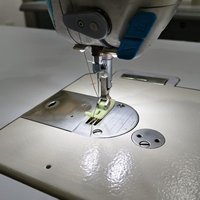 Machine à coudre à point noué JACK A4 d'occasion pour la production de vêtements et de vêtements Machine à coudre industrielle d'occasion à une aiguille