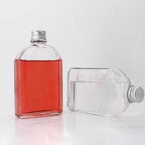 Tùy chỉnh rỗng bán buôn 200ml Thủy Tinh Phẳng rượu chai chai thủy tinh cho <span class=keywords><strong>Vodka</strong></span> <span class=keywords><strong>20cl</strong></span> với nhôm Làm xáo trộn Nắp rõ ràng - Product Image 1