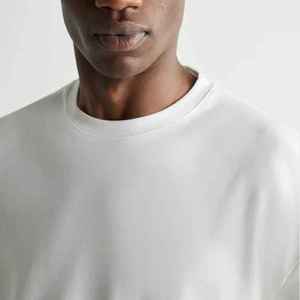 เสื้อยืดคอกลมผ้าฝ้าย100% สีทึบผ้าถักแบบลำลองย้อมสีธรรมดาดีไซน์ว่างเปล่าและโลโก้ด้านหน้า - Product Image 1