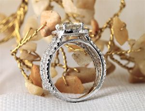 แหวนเจ้าสาวประดับหินทรงกลมสไตล์รัศมีวงเพชรสำหรับผู้หญิง - Product Image 4